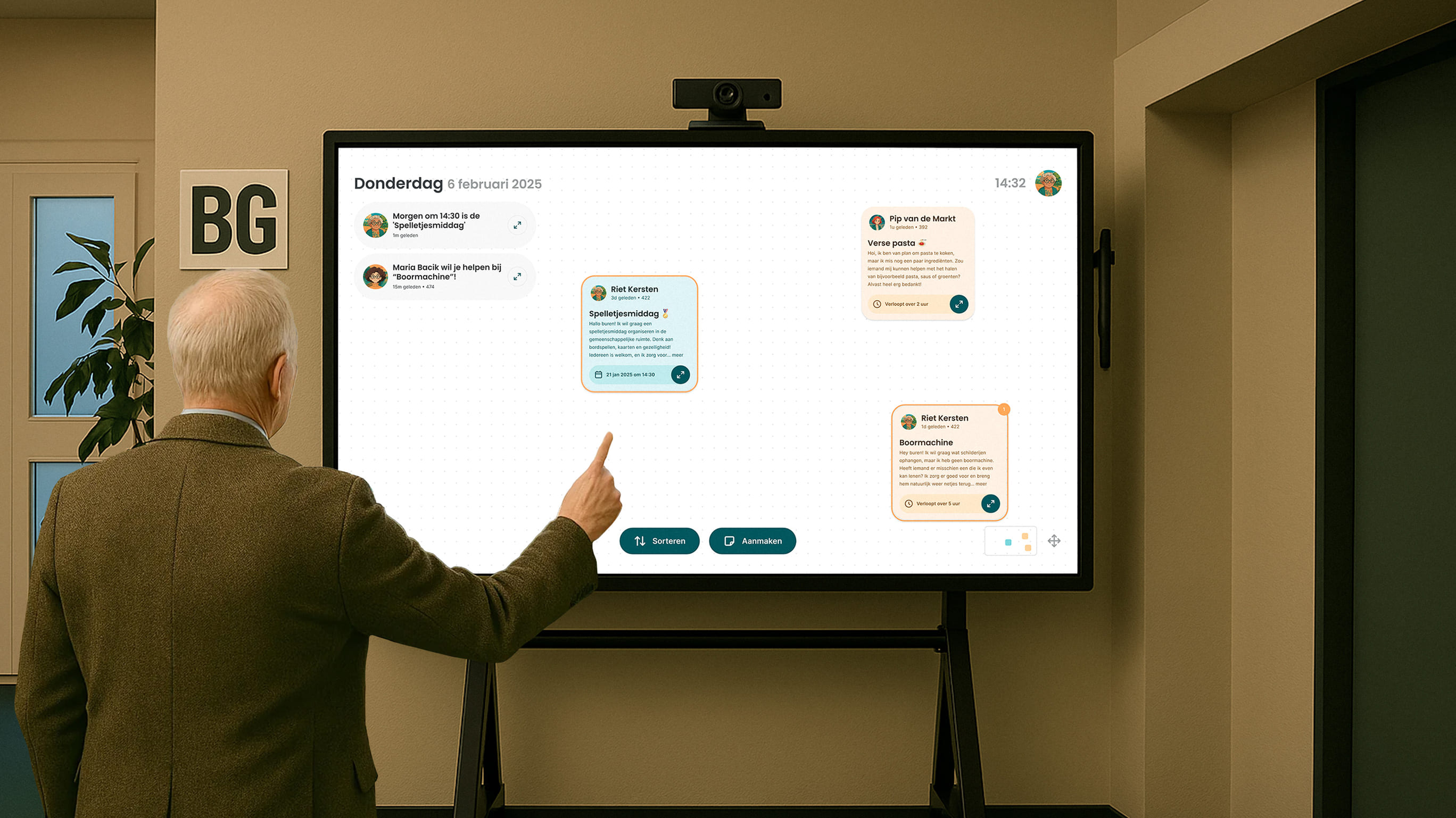 A resident using the Hallo Buur digital bulletin board on a large screen